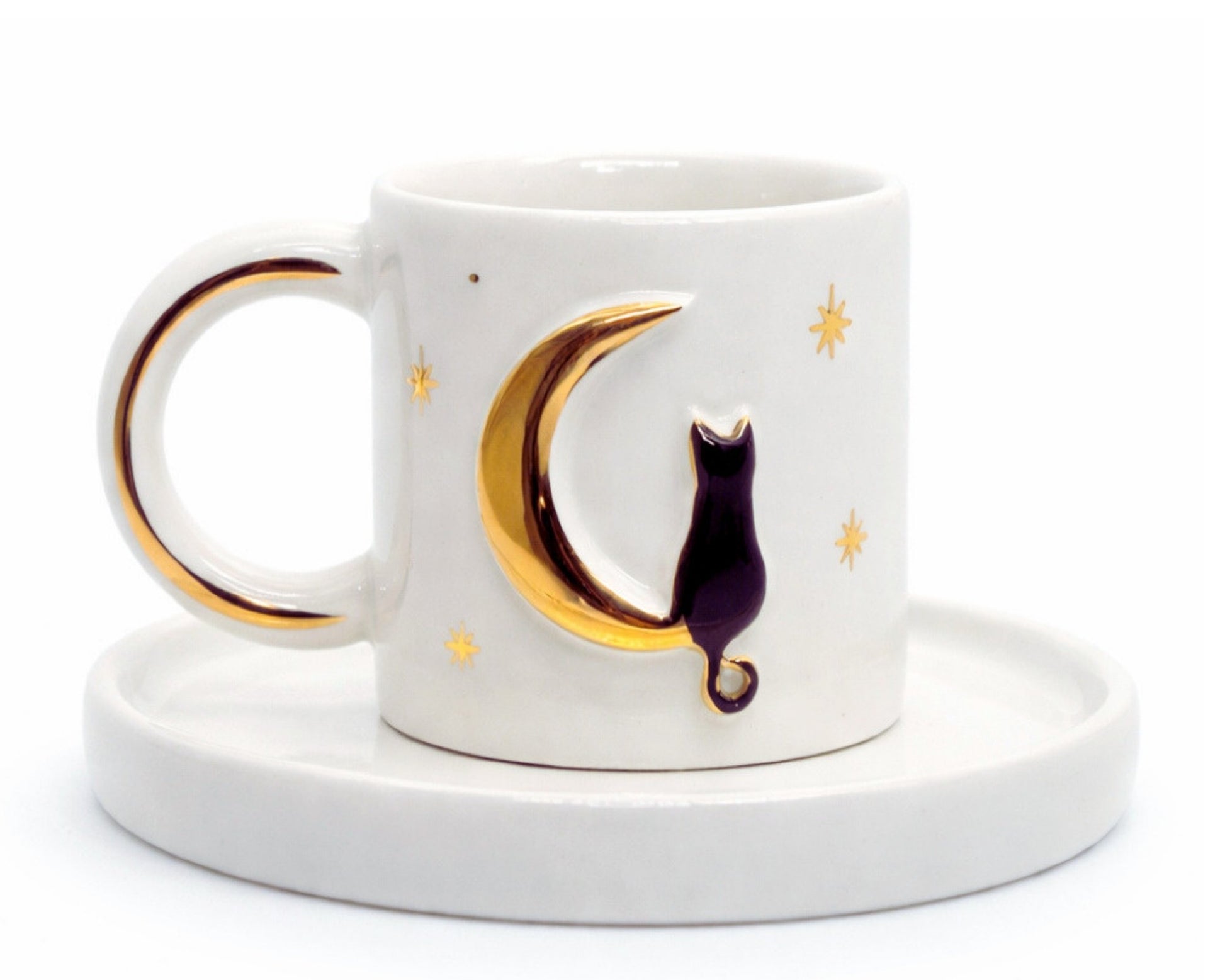 Hediyelik aydaki kedi desenli el yapımı seramik fincan, 24K altın dekorlu premium handmade gold luna temalı tasarım fincan ve tabağı.